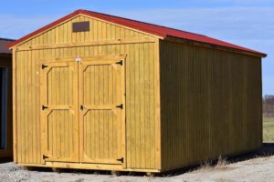 this is a treated wood utility building for sale or rent to own in Gulfport, MS by Gulf Coast Buildings